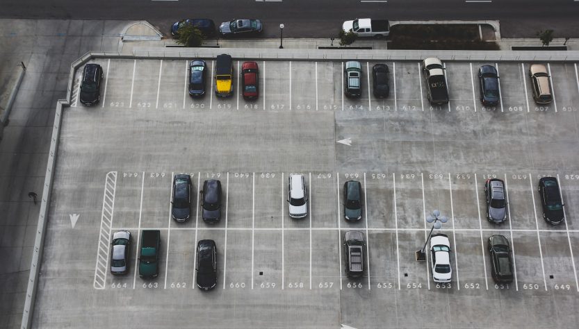 aerial view of cars parked on parking lot